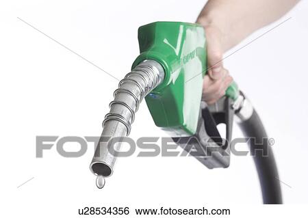 Hand holds nozzle with drop of water coming out View Large Photo Image Stock Photograph - Hand holds nozzle with drop of water coming out. Fotosearch
