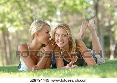 2 young blonde females in park, Regina, Saskatchewan View Large Photo Image Stock Photography - 2 young blonde females in park, Regina, Saskatchewan. Fotosearch