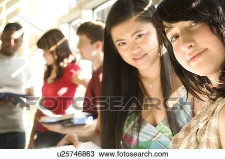 Groups of students casually talking, beside solar panelled windows, Winnipeg, Canada View Large Photo Image Stock Image - Groups of students casually talking, beside solar panelled windows, Winnipeg, Canada. Fotosearch