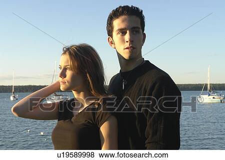 Teenage couple Clear Lake; Canada, Manitoba, Riding Mountain National Park View Large Photo Image Stock Photo - Teenage couple Clear Lake; Canada, Manitoba, Riding Mountain National Park. Fotosearch