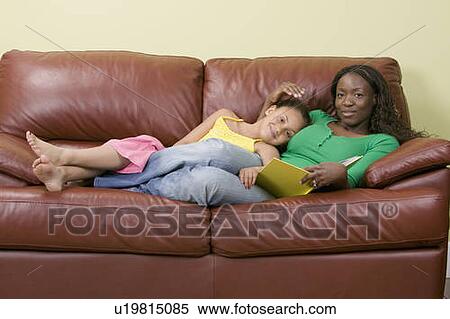 African American mom and Mulatto girl 6 years. Reading. View Large Photo Image Stock Photography - African American mom and Mulatto girl 6 years. Reading.. Fotosearch