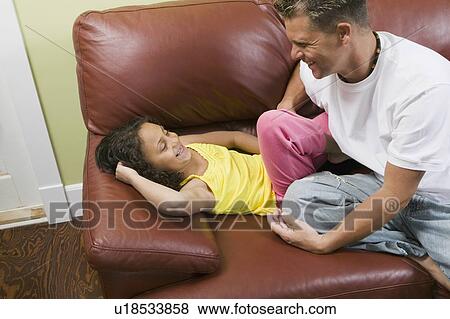 Stock Photo - Caucasian father and Mulatto girl (6 years old). Abbotsford, BC. Fotosearch