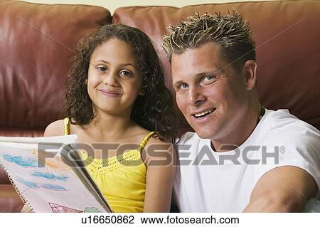 Caucasian father with Mulatto girl (6 years old) at artwork View Large Photo Image Stock Image - Caucasian father with Mulatto girl (6 years old) at artwork. Fotosearch