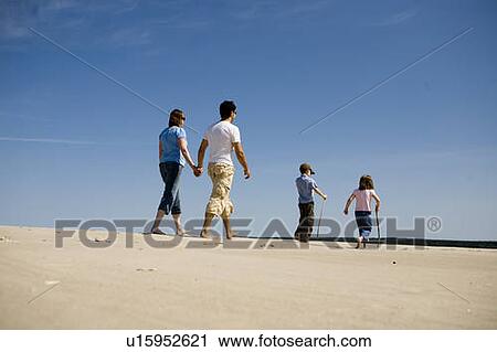 Family walking on sand at Grand Beach Provincial Park, Manitoba, Canada View Large Photo Image Stock Image - Family walking on sand at Grand Beach Provincial Park, Manitoba, Canada. Fotosearch
