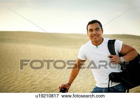 Stock Photo - Hiking in the Great Sand Hills of Saskatchewan, Canada. Fotosearch