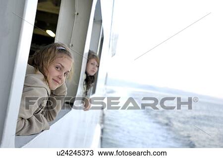 Stock Image - Pre-teen girls on ferry, British Columbia, Canada. Fotosearch