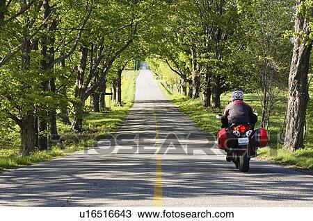 View of motorcycle and road, Eastern Townships, Quebec, Canada. View Large Photo Image Stock Image - View of motorcycle and road, Eastern Townships, Quebec, Canada.. Fotosearch