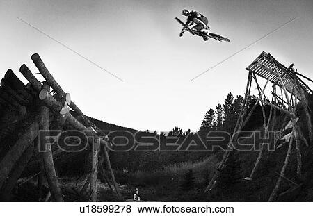 Black and white mountain jumping log jump; Canada, Alberta, Moose Mountain View Large Photo Image Stock Photo - Black and white mountain jumping log jump; Canada, Alberta, Moose Mountain. Fotosearch