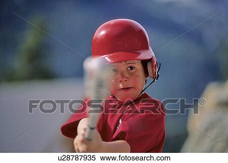 Stock Photography - boy, 6, hits baseball with bat. Fotosearch