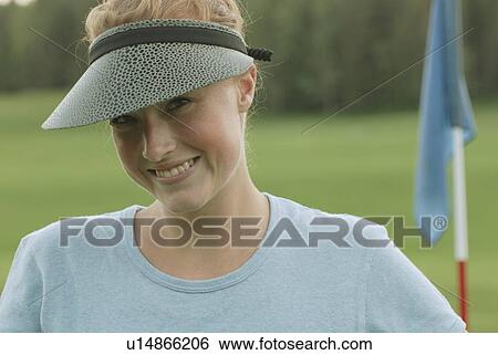 Woman on putting green, wearing hemp shirt, organic golf course, Clear Lake Golf Course, Riding Mountain National Park, Manitoba, Canada View Large Photo Image Stock Photograph - Woman on putting green, wearing hemp shirt, organic golf course, Clear Lake Golf Course, Riding Mountain National Park, Manitoba, Canada. Fotosearch