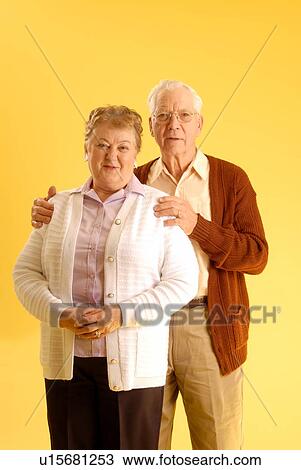 Stock Image - Senior couple posing; Canada, Saskatchewan, Regina. Fotosearch
