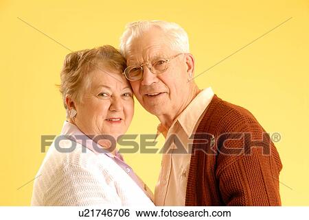 Senior couple posing; Canada, Saskatchewan, Regina View Large Photo Image Stock Photograph - Senior couple posing; Canada, Saskatchewan, Regina. Fotosearch