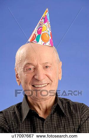 Senior Male Party Hat; Canada, Saskatchewan, Regina View Large Photo Image Stock Photo - Senior Male Party Hat; Canada, Saskatchewan, Regina. Fotosearch
