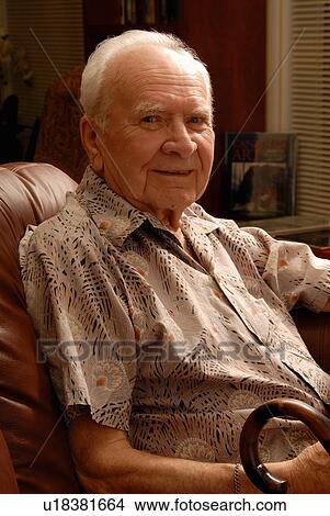 Senior male sitting, Regina, Saskatchewan View Large Photo Image Picture - Senior male sitting, Regina, Saskatchewan. Fotosearch