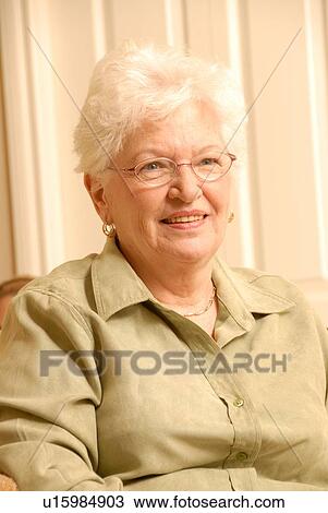 Senior Woman in chair; Canada, Saskatchewan, Regina View Large Photo Image Stock Image - Senior Woman in chair; Canada, Saskatchewan, Regina. Fotosearch