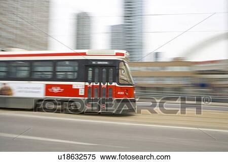 Stock Photography - Electric Streetcar, Toronto Transit System, no carbon emissions; Canada, Ontario, Toronto. Fotosearch