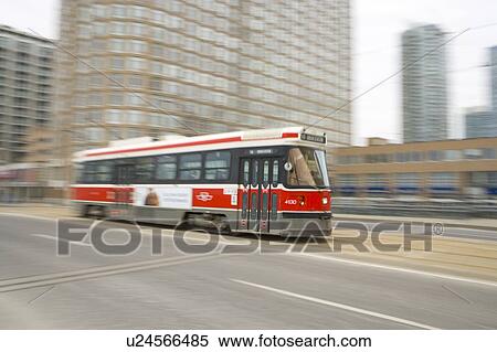 Stock Photography - Electric Streetcar, Toronto Transit System, no carbon emissions; Canada, Ontario, Toronto. Fotosearch