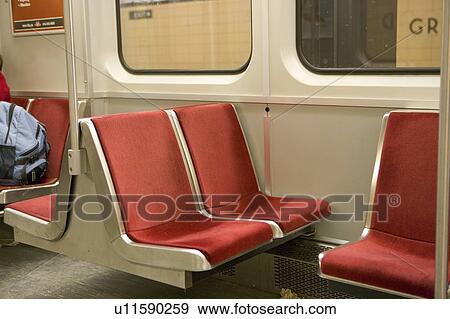 Stock Photo - Empty seats, interior of subway car. Fotosearch
