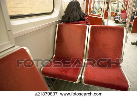 Empty seats, Interior of subway car View Large Photo Image Stock Photo - Empty seats, Interior of subway car. Fotosearch