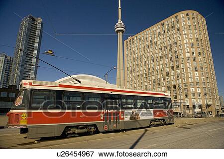 Streetcar in Toronto in front of CN Tower and Rogers Centre, formerly the Skydome View Large Photo Image Stock Photo - Streetcar in Toronto in front of CN Tower and Rogers Centre, formerly the Skydome. Fotosearch