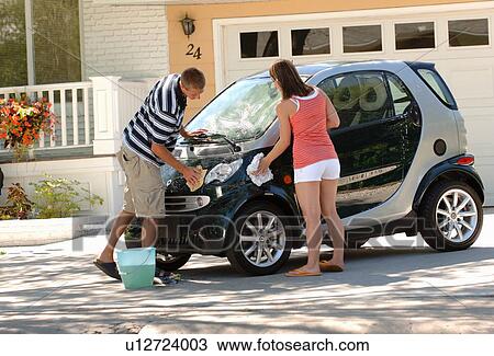 Teenage boy & girl washing smart car, Regina, Saskatchewan View Large Photo Image Stock Image - Teenage boy & girl washing smart car, Regina, Saskatchewan. Fotosearch