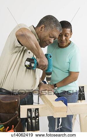 African American Couple Doing Home Improvement, B. C. View Large Photo Image Stock Photo - African American Couple Doing Home Improvement, B. C.. Fotosearch