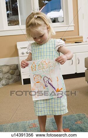 3 year old girl showing her artwork, B. C. View Large Photo Image Stock Photograph - 3 year old girl showing her artwork, B. C.. Fotosearch