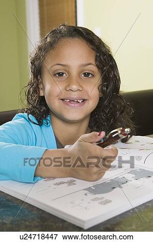 6 year old Mulatto girl practicing arithmetic. View Large Photo Image Stock Photo - 6 year old Mulatto girl practicing arithmetic.. Fotosearch