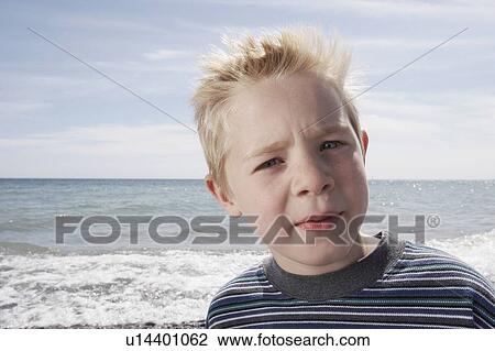 Boy on beach, Whitby, Ontario. View Large Photo Image Stock Image - Boy on beach, Whitby, Ontario.. Fotosearch