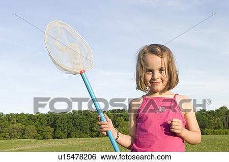 Girl - 6 years old with a net in the park, Winnipeg, Canada View Large Photo Image Stock Photograph - Girl - 6 years old with a net in the park, Winnipeg, Canada. Fotosearch