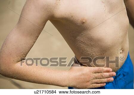 Picture - Grains of sand stuck to skin, Grand Beach Provincial Park, Manitoba, Canada. Fotosearch