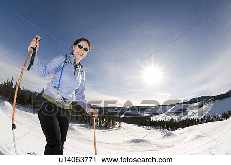 A woman backcountry skiing, Strathcona Provincial Park near Courtenay, BC, Canada View Large Photo Image Stock Image - A woman backcountry skiing, Strathcona Provincial Park near Courtenay, BC, Canada. Fotosearch