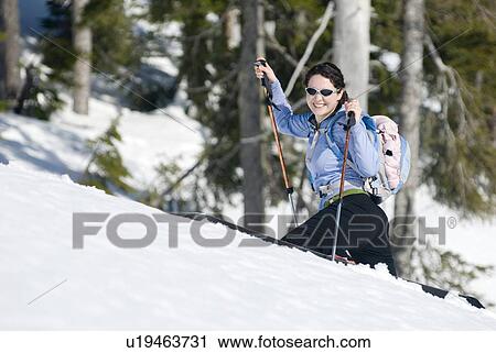 Stock Image - A woman backcountry skiing, Strathcona Provincial Park near Courtenay, BC, Canada. Fotosearch