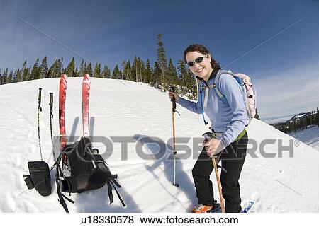 Stock Photo - A woman backcountry skiing, Strathcona Provincial Park near Courtenay, BC, Canada. Fotosearch