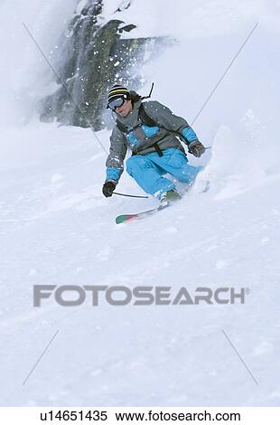 Stock Photography - Fresh powder skiing on Whistler Mountain, Whistler, BC, Canada. Fotosearch