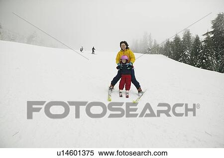 Mom Teaching 4 Year Old Daughter to Ski, Grouse Mountain, North Vancouver, BC Canada View Large Photo Image Stock Photography - Mom Teaching 4 Year Old Daughter to Ski, Grouse Mountain, North Vancouver, BC Canada. Fotosearch