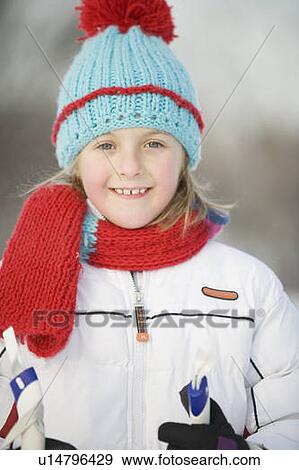 Outdoor winter portrait of 9 year old girl in colourful woolen hat, Winnipeg, Canada View Large Photo Image Stock Photo - Outdoor winter portrait of 9 year old girl in colourful woolen hat, Winnipeg, Canada. Fotosearch