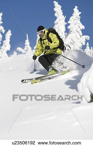 Powder skiing on a clear day on Whistler Mountain, Whistler, BC, Canada View Large Photo Image Stock Image - Powder skiing on a clear day on Whistler Mountain, Whistler, BC, Canada. Fotosearch