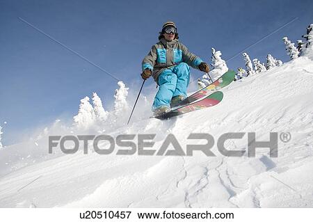 Powder skiing on a clear day on Whistler Mountain, Whistler, BC, Canada View Large Photo Image Stock Photo - Powder skiing on a clear day on Whistler Mountain, Whistler, BC, Canada. Fotosearch