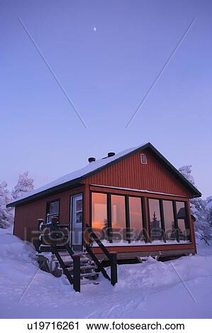 Stock Image - View of La Chouette shelter and moon, Quebec, Canada. Fotosearch