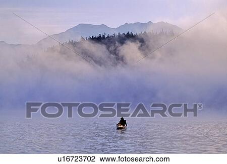 Canoeist on Alta Lake, with mountains and mist View Large Photo Image Stock Image - Canoeist on Alta Lake, with mountains and mist. Fotosearch