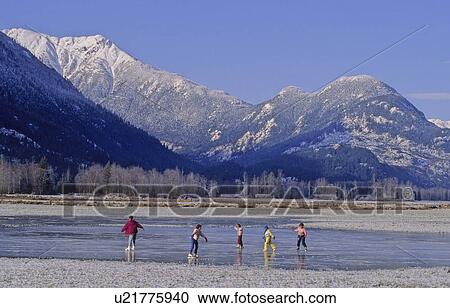 Kids skating on a pond on a clear winter day, Pemberton, BC Canada View Large Photo Image Stock Image - Kids skating on a pond on a clear winter day, Pemberton, BC Canada. Fotosearch