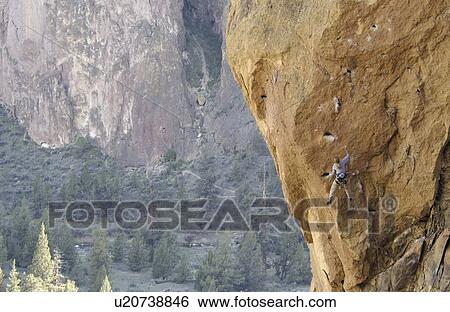 Woman (20-25) climbing Toxic a climbing route in Smith Rock State Park View Large Photo Image Stock Photograph - Woman (20-25) climbing Toxic a climbing route in Smith Rock State Park. Fotosearch