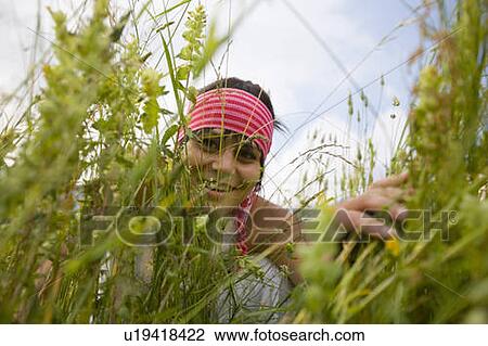 Young woman (19) in alpine meadow, Servoz, Haute Savoie, France View Large Photo Image Stock Image - Young woman (19) in alpine meadow, Servoz, Haute Savoie, France. Fotosearch