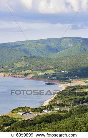 Stock Photo - View of village and Gulf of St. Lawrence, Cape Breton Highlands National Park, Nova Scotia, Canada. Fotosearch