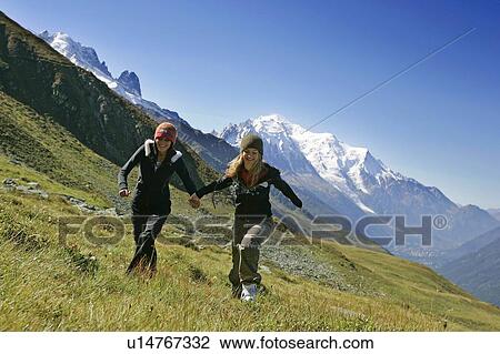 Young girls (19) hiking in front of Mont Blanc, Col de Balme Chamonix, France View Large Photo Image Stock Image - Young girls (19) hiking in front of Mont Blanc, Col de Balme Chamonix, France. Fotosearch