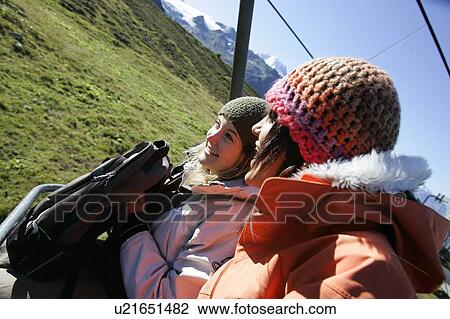 Young girls (19) on ski lift, Col de Balme Chamonix, France View Large Photo Image Stock Image - Young girls (19) on ski lift, Col de Balme Chamonix, France. Fotosearch
