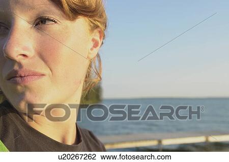 Close-up of woman beside dock at lake, Clear Lake, Riding Mountain National Park, Manitoba, Canada View Large Photo Image Stock Image - Close-up of woman beside dock at lake, Clear Lake, Riding Mountain National Park, Manitoba, Canada. Fotosearch