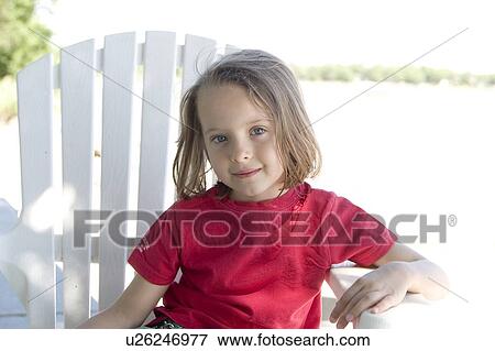 Stock Photo - Girl - 5 years old at Lake Winnipeg, Canada. Fotosearch