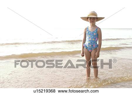 Stock Photo - Girl - 5 years old at the Lake Winnipeg, Canada. Fotosearch